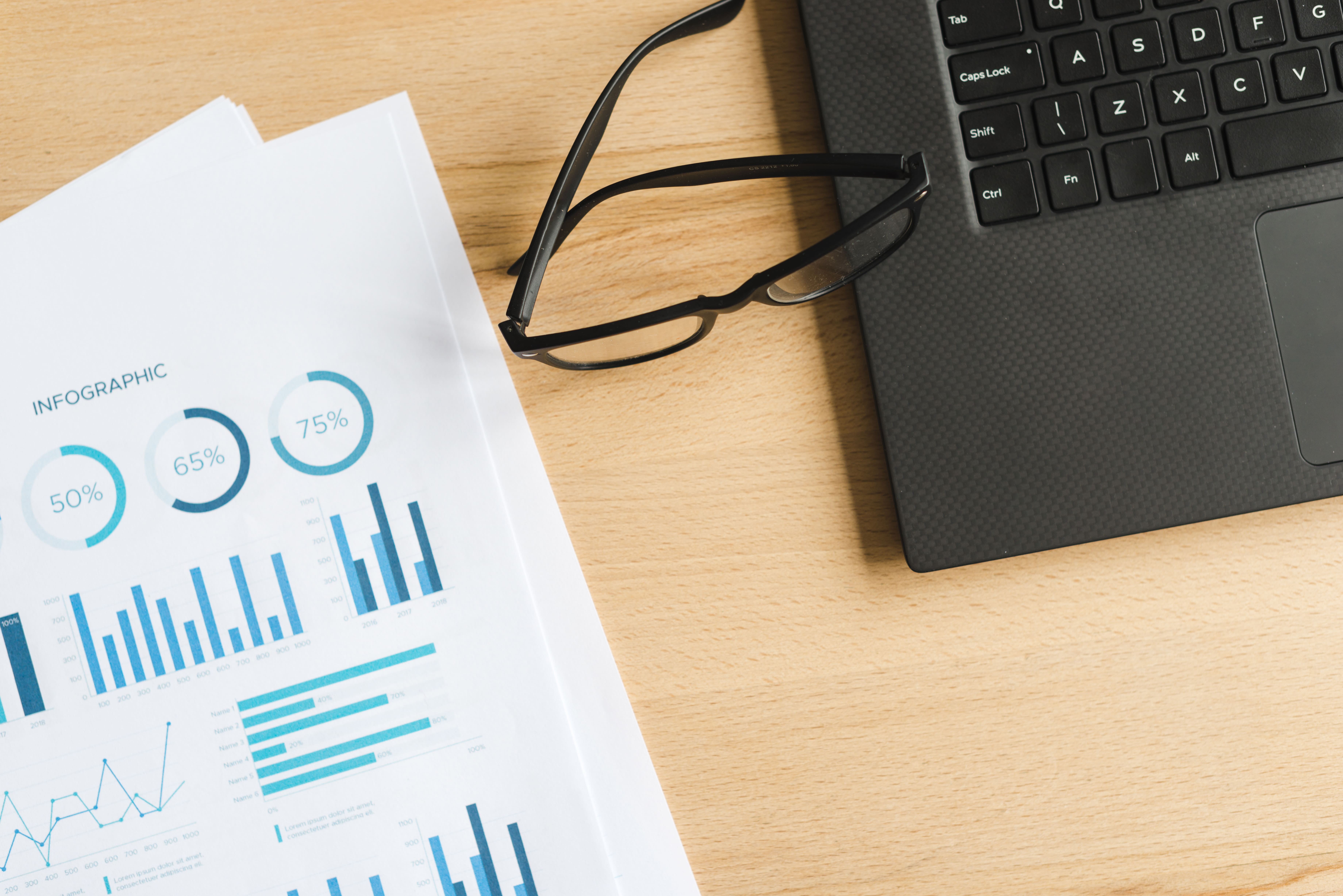 office-desktop-with-laptop-glasses